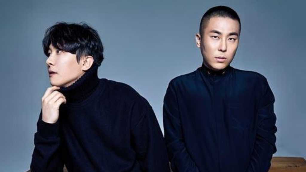 Black Eyed Pilseung, known for hits with TWICE and Apink, ends collaboration after 16 years, with Rado continuing at HIGH-UP Entertainment.