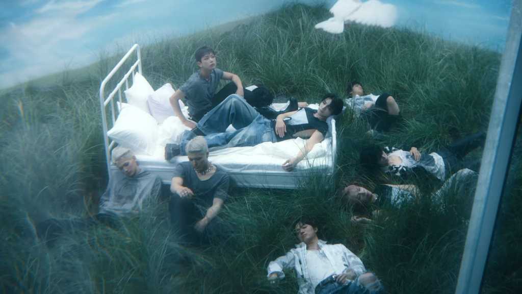 &TEAM debuts in Korea with mini-album "Back to Life," showcasing their growth and resilience through music and powerful visuals.