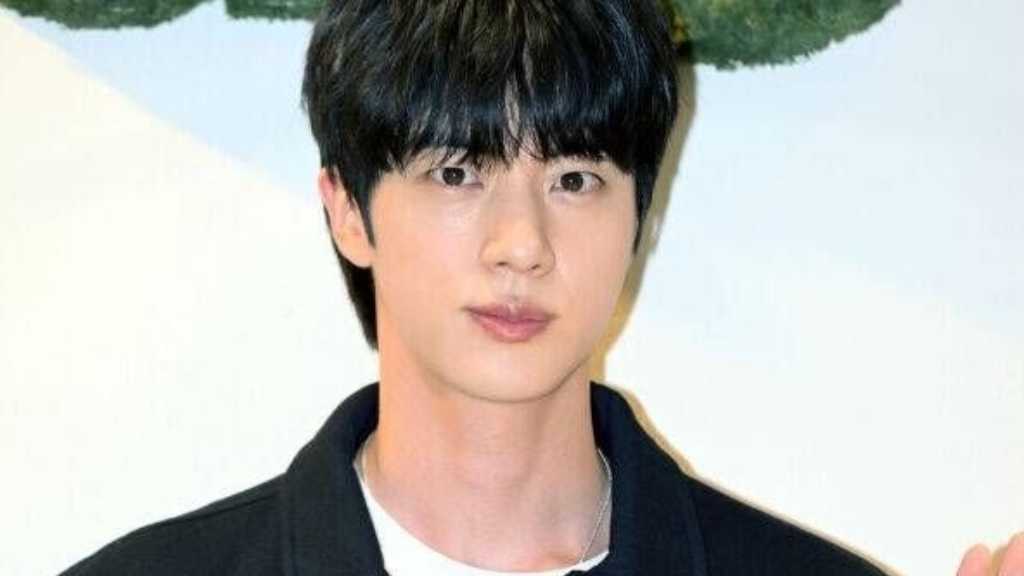 Jin from BTS donated 100 million won to support vulnerable communities in Busan ahead of his birthday, aiding children's welfare programs.