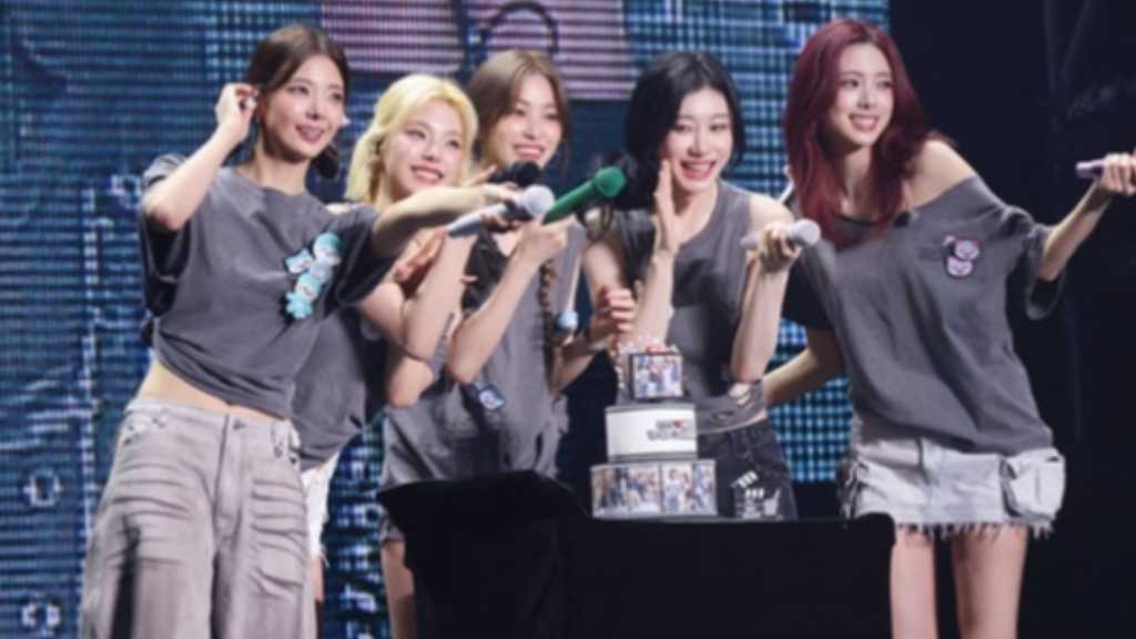 ITZY holds successful fan meeting, announces contract renewal with JYP, and showcases diverse performances and fan interactions.