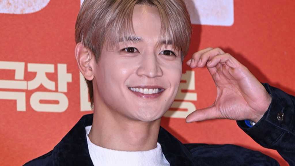 SHINee's Minho has released two new songs in Japan, 'Flawless' and 'Sunkissed', showcasing his unique artistry and charm.