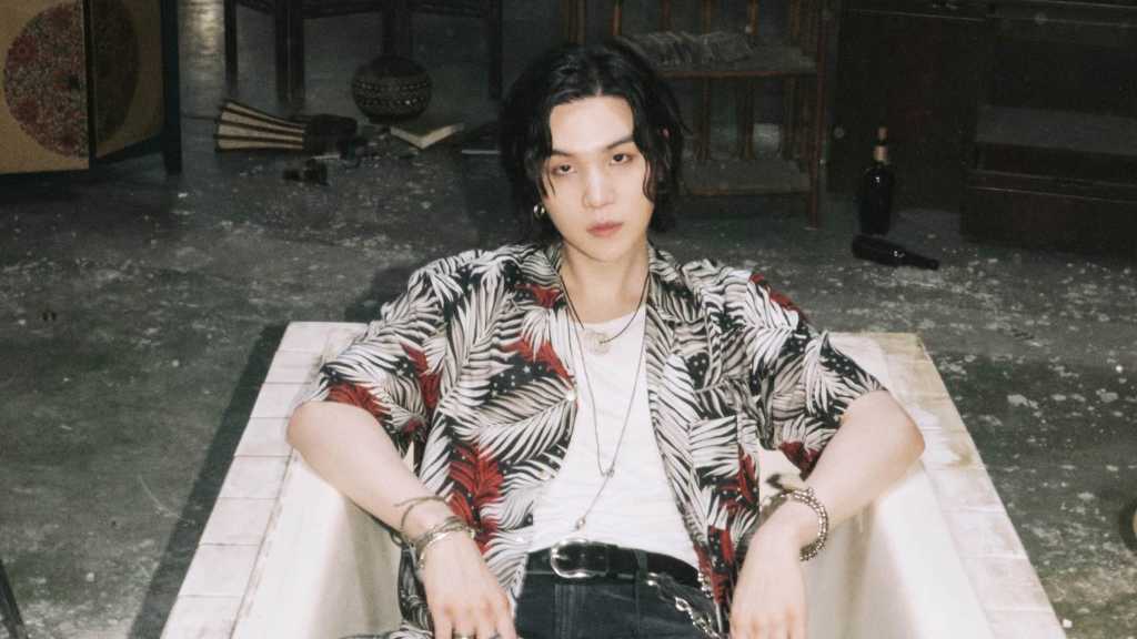 BTS's SUGA co-authored a music therapy program for autistic children, contributing to the establishment of a treatment center.