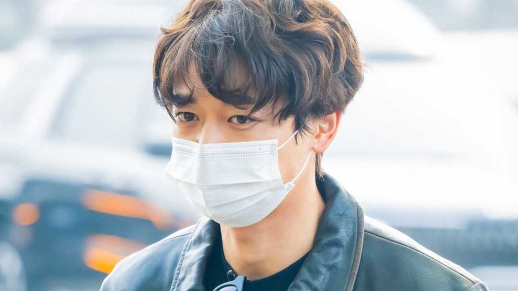 Minho of SHINee departs for Bangkok for SMTOWN LIVE 2025-26. The event is set for February 14, 2026, marking a 13-year return.