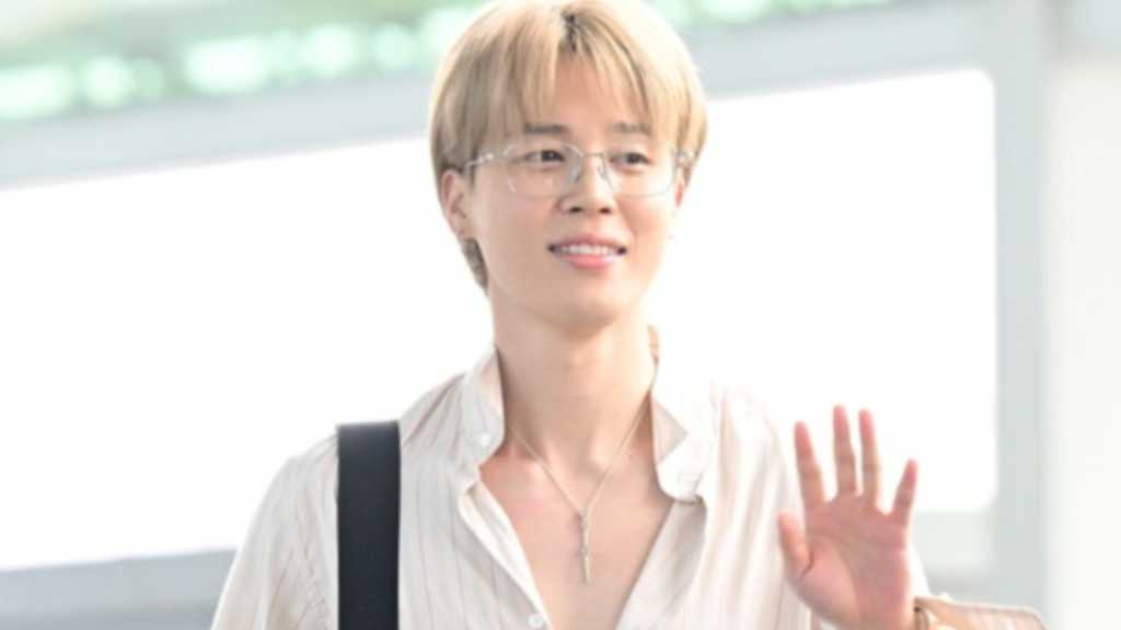 BTS's Jimin flew to Paris for a fashion show, showcasing a new blonde look and preparing for the group's comeback. He also made a donation.