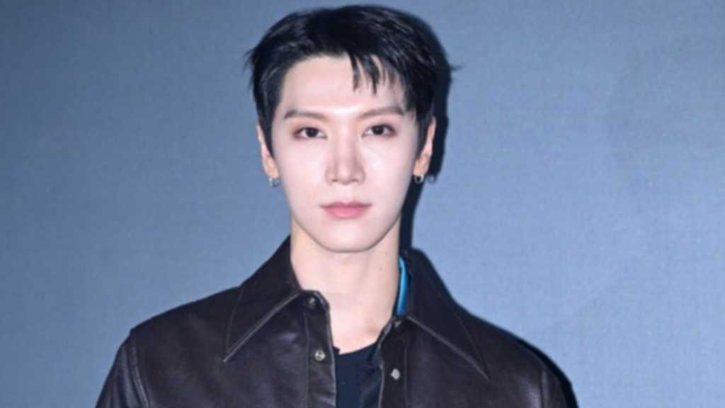 Ten denied online dating rumors at a concert, and his agency said it is monitoring false posts and will take legal action if needed.