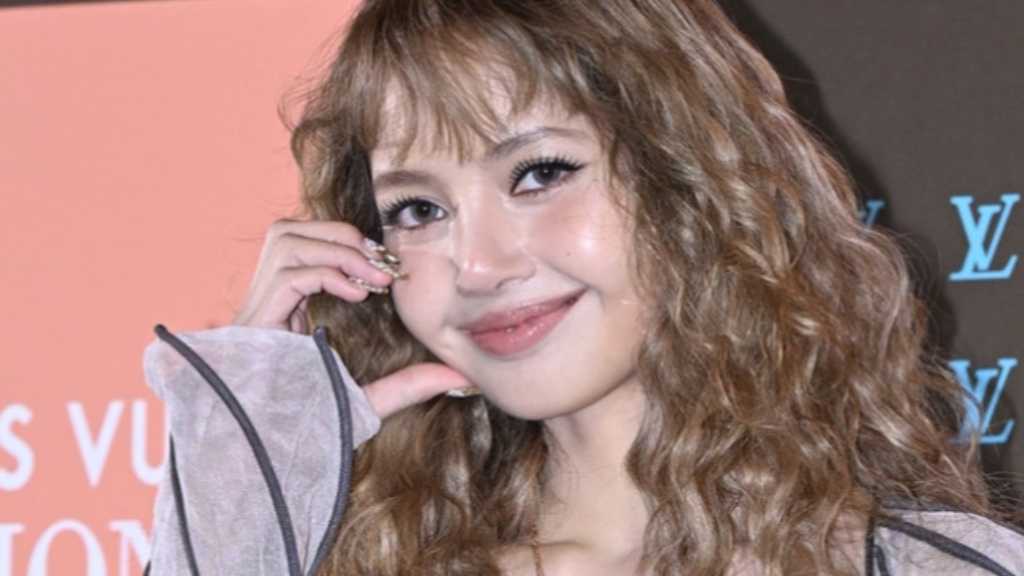 Lisa from BLACKPINK attended a Louis Vuitton event in Seoul, joined by stars like BTS's J-Hope and Stray Kids' Felix.