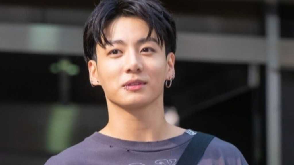 BTS's Jungkook shares a solo mukbang, showcasing his casual side and surprising fans with his home view of Namsan Tower.