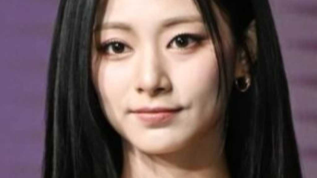 Tzuyu of TWICE expresses condolences on Instagram for victims of a large fire in Hong Kong, wishing them strength and peace.