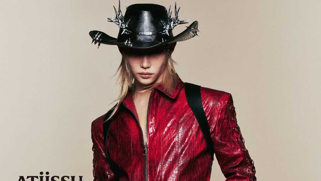 ATiiSSU unveils 'DESERT COWBOY COLLECTION' campaign film featuring Stray Kids' Felix, showcasing a unique aesthetic and style.