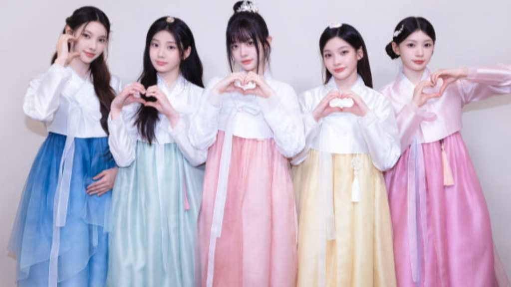 ILLIT celebrates Chuseok with fans, sharing warm messages and showcasing their charm in traditional attire, while preparing for a comeback.