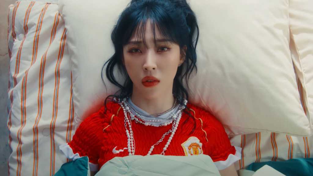 Moonbyul of MAMAMOO releases her 4th mini-album 'laundri' and the MV for 'Goodbyes and Sad Eyes', showcasing her emotional depth.