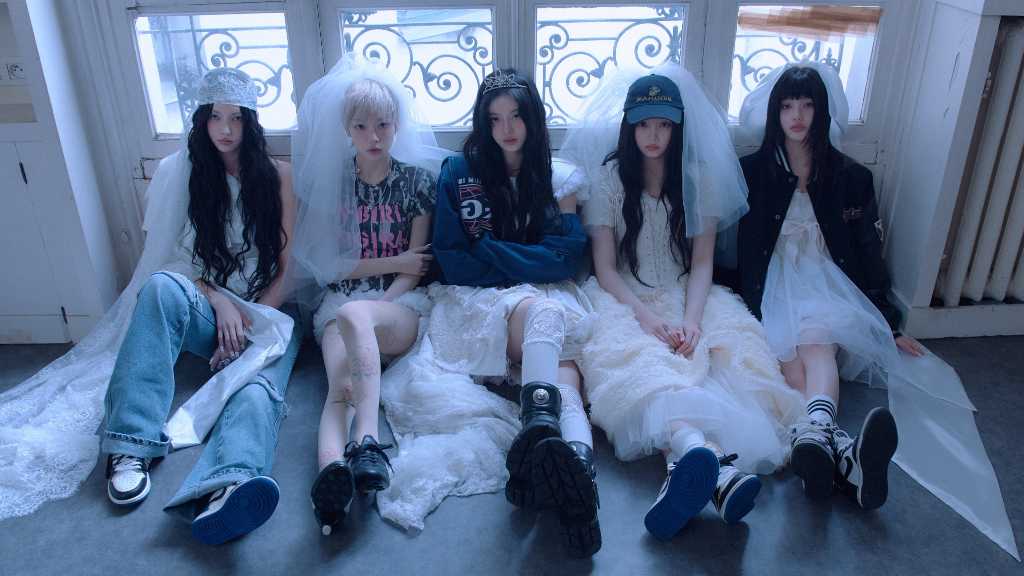 ILLIT showcased their charm with concept photos and film for their upcoming mini-album, raising anticipation for their comeback.