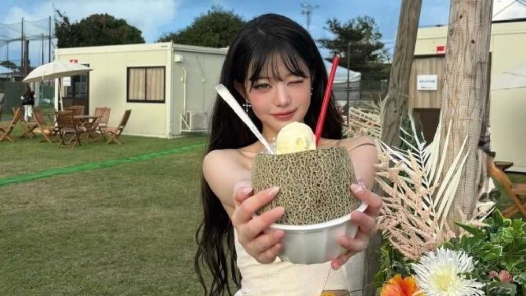 Wonyoung shares refreshing summer photos on Instagram, capturing fans' hearts with her charm and garnering massive engagement.