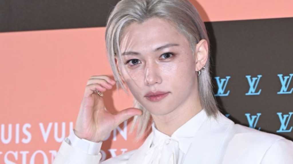 Stray Kids' Felix, BTS' J-Hope, and BLACKPINK's Lisa attend a Louis Vuitton event in Seoul, showcasing luxury fashion and star power.