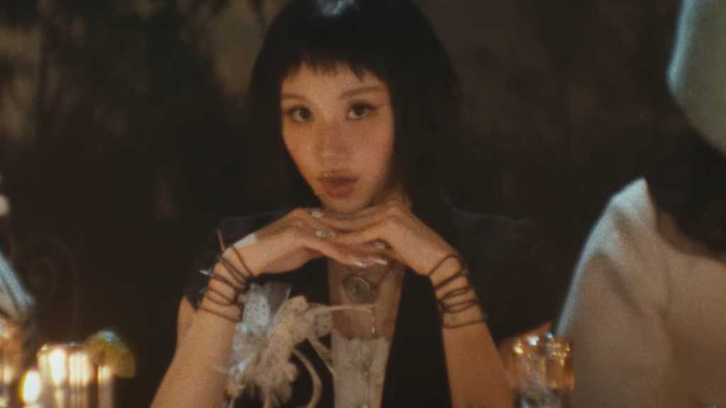 Chaeyoung from TWICE debuts solo with 'LIL FANTASY vol.1' and 'SHOOT (Firecracker)' music video, showcasing her artistic identity.