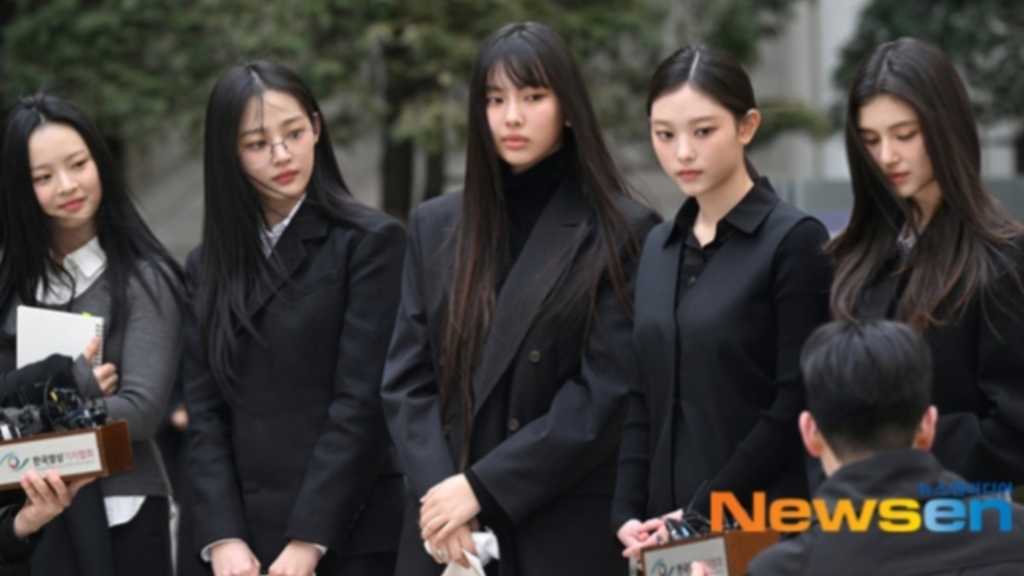 ADOR intensifies legal action to protect NewJeans from malicious rumors and privacy violations, while addressing contract disputes with members.