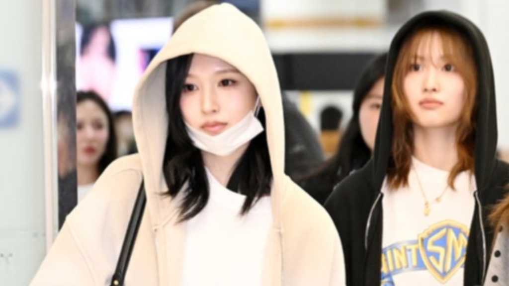 MISAMO of TWICE arrives at Gimpo International Airport after completing their schedule in Japan, showcasing their stylish looks.