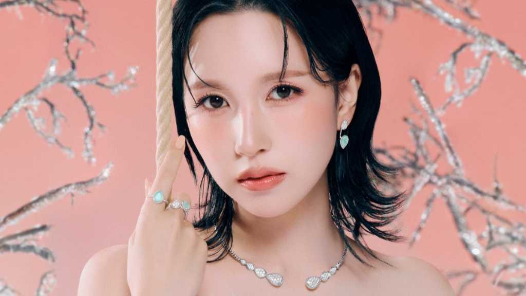 TWICE's Mina and actress Han So-hee feature in BOUCHERON's holiday campaign, showcasing stunning jewelry in a magical winter setting.