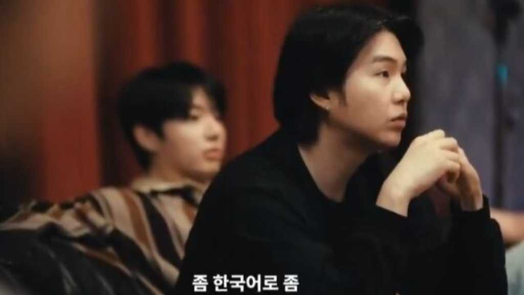 BTS members express desire for more Korean lyrics in their album 'ARIRANG' during a Netflix documentary, highlighting creative differences.