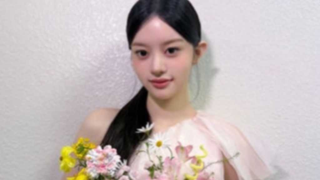Minju of ILLIT graduates from KBS Music Bank after 1 year, expressing gratitude and promising to continue showcasing her talent.