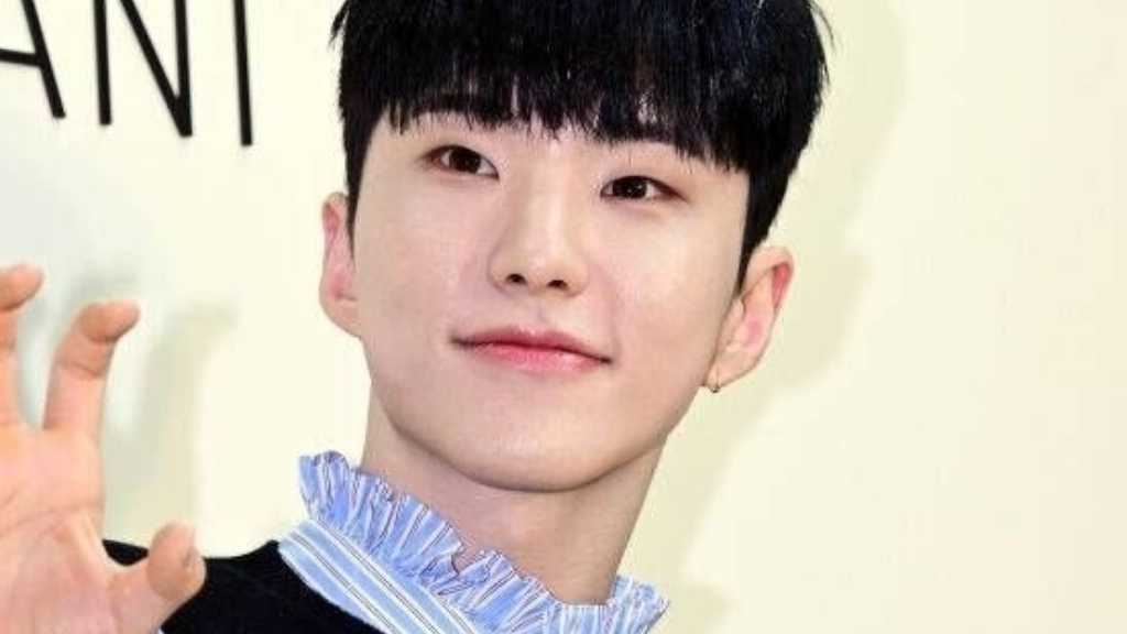 Hoshi from SEVENTEEN surprises fans with solo track 'TAKE A SHOT' before military enlistment, showcasing his rap skills and passion.