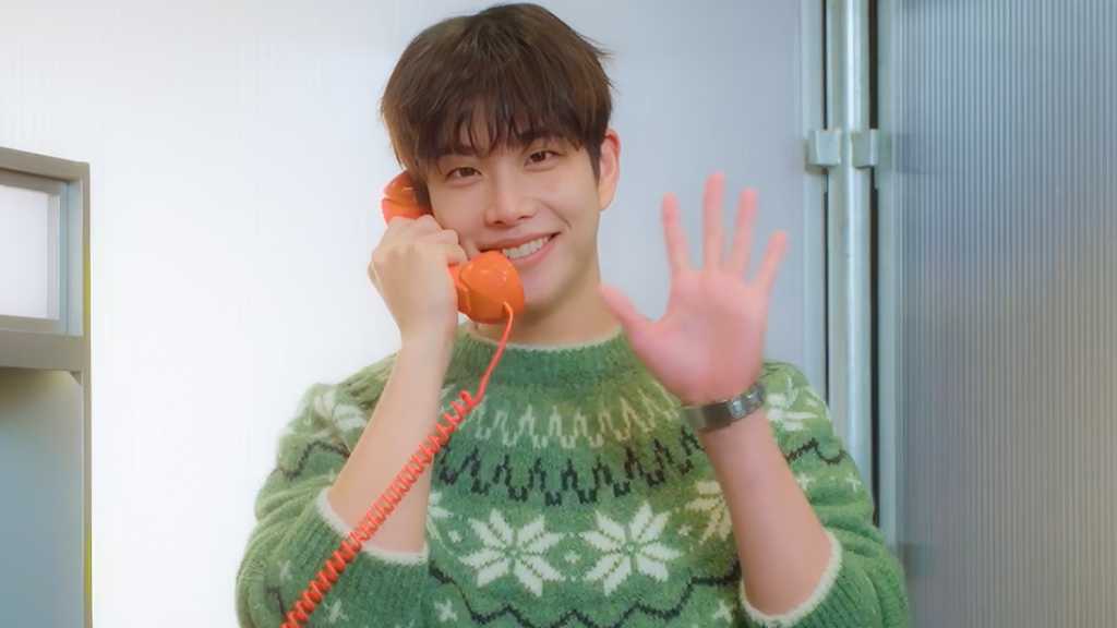 MJ from ASTRO appears on the new YouTube channel PBLive, featuring K-POP artists and live performances from a phone booth-themed setup.