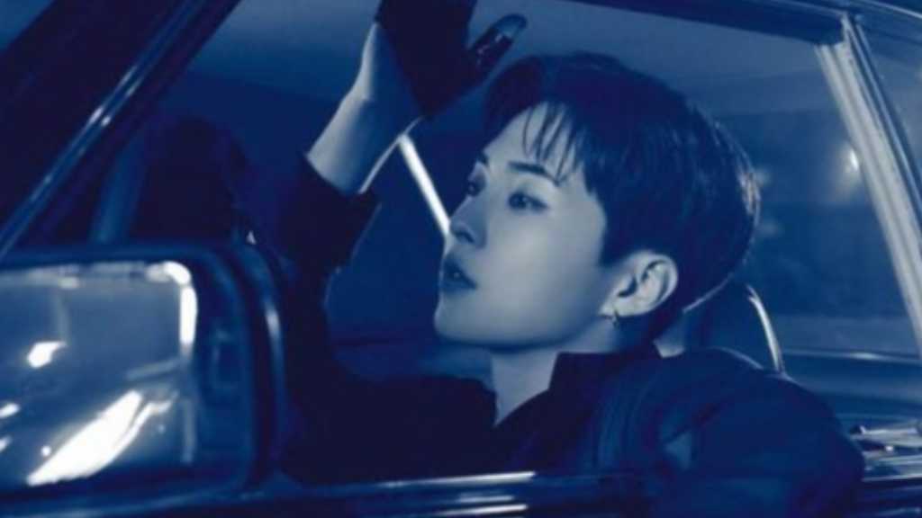 Xiumin's concept photos for 'Overdrop' enhance anticipation for his comeback, showcasing his charm and fashion sense.