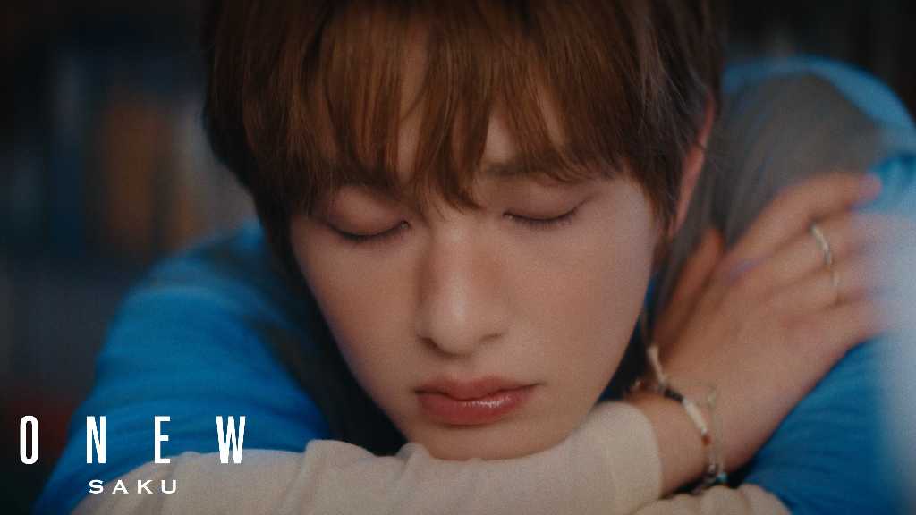 Onew of SHINee shares a teaser for the music video "Like a Flower," reflecting on cherished memories and upcoming performances in Japan.