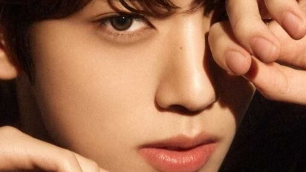 ZEROBASEONE's Han Yujin turns 20, featured in Allure Korea's digital cover, showcasing a chic photoshoot with TRUDON collaboration.