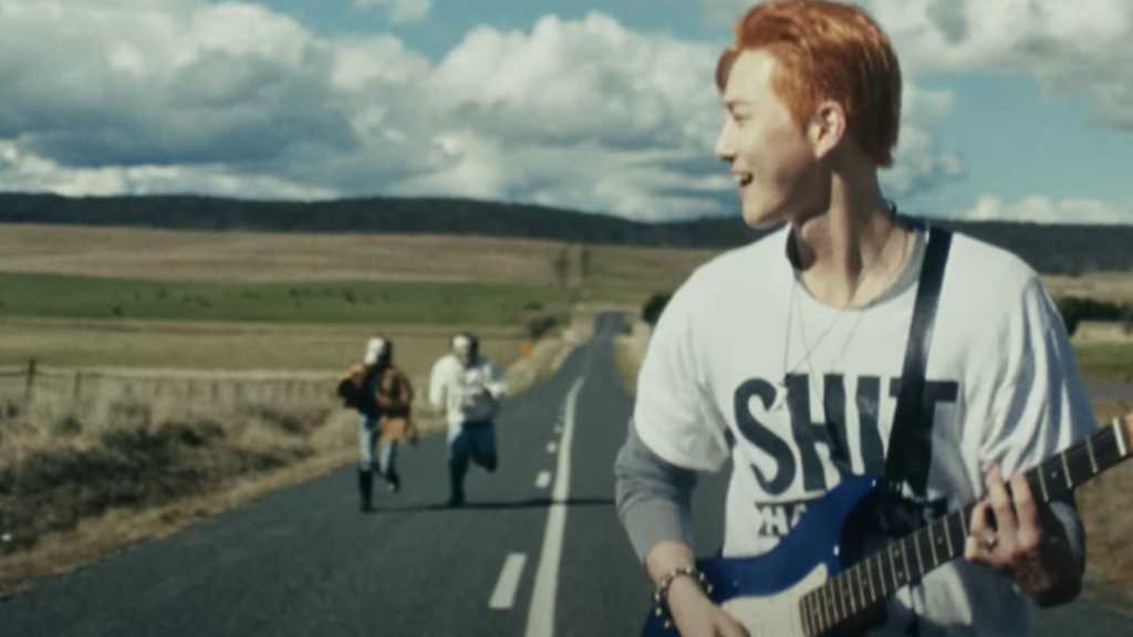 Suho of EXO is back with his 4th mini-album 'Who Are You', featuring 7 tracks and a music video, showcasing his unique talent.