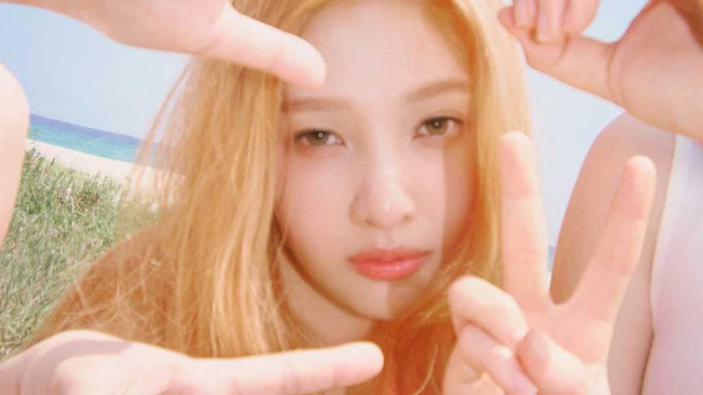 Joy from Red Velvet releases her 1st mini-album, "From JOY, with Love," featuring the title track "Love Splash!" and heartfelt themes.