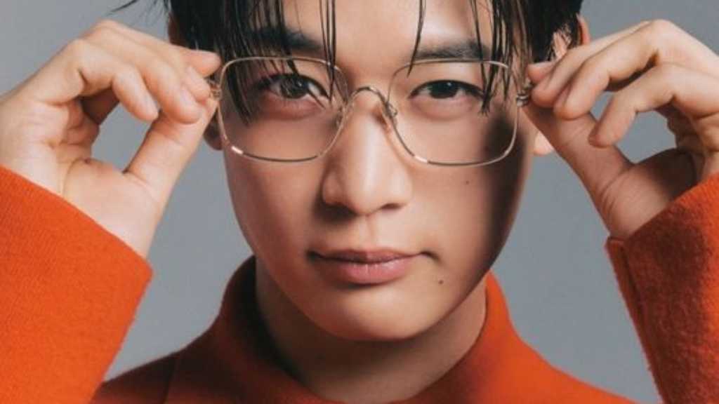 Minho from SHINee showcases his natural charm in GQ KOREA, reflecting on a fulfilling year and expressing love for his fans.