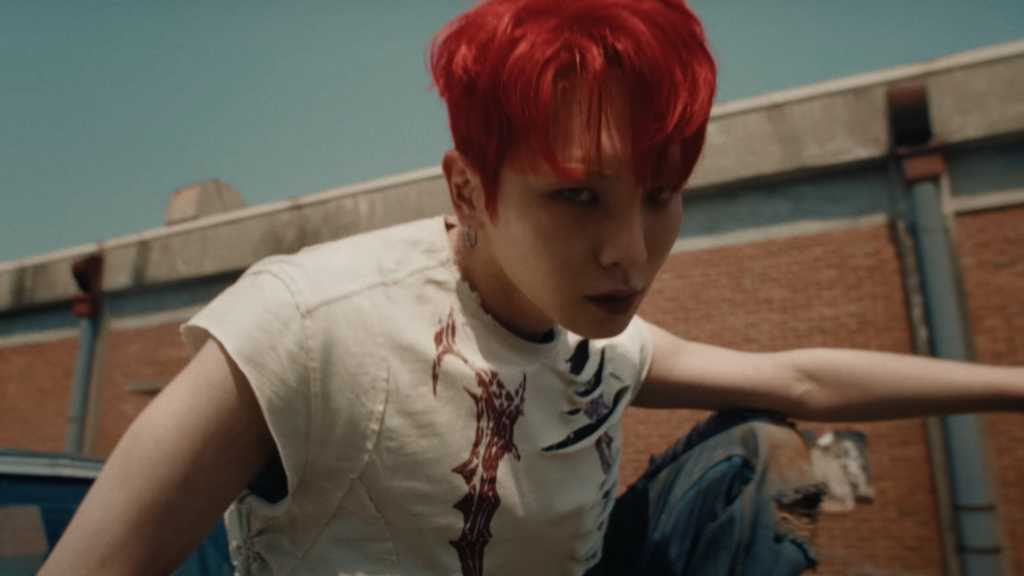 SHINee's Key returns with his 3rd album 'HUNTER', featuring 10 tracks and a music video, showcasing a unique concept and dynamic vocals.