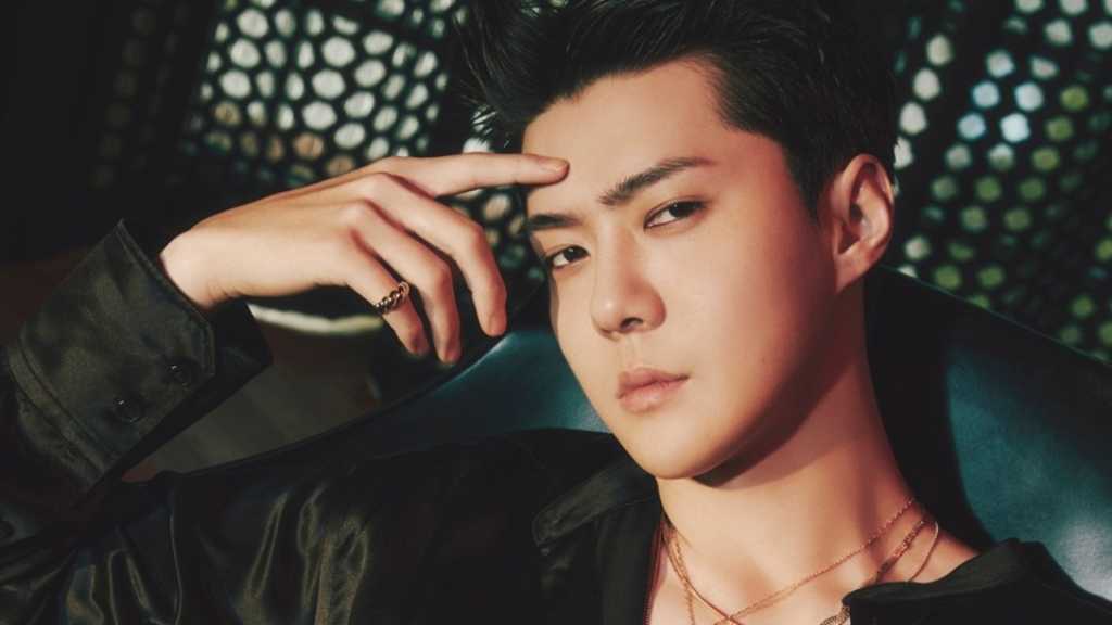 EXO's Sehun completes alternative service and is discharged. He reflects on his time and hints at a comeback in December 2023.