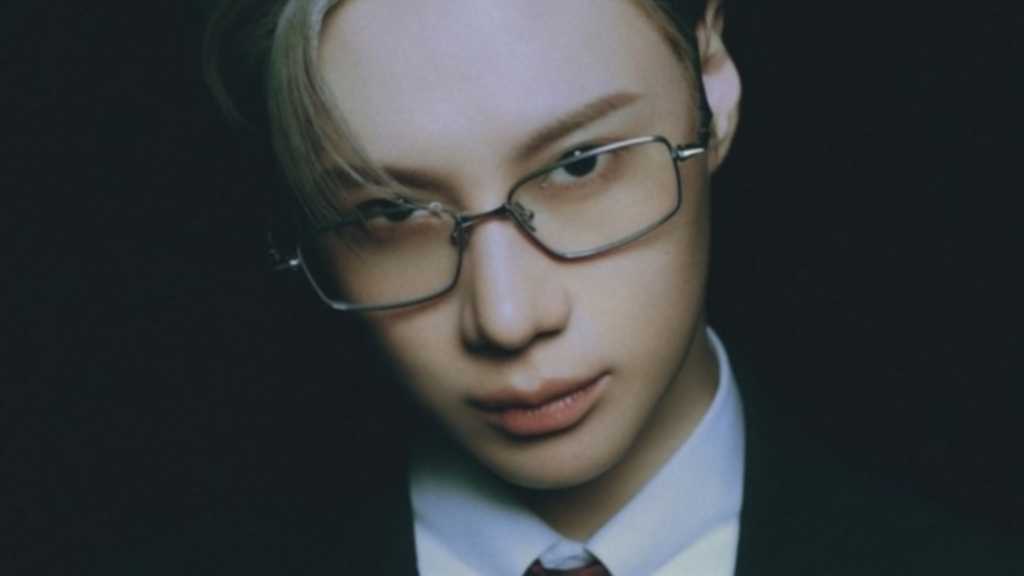 Taemin of SHINee reveals a powerful aura in new photos for his digital single 'Veil', with a tour planned across Japan in 2025.