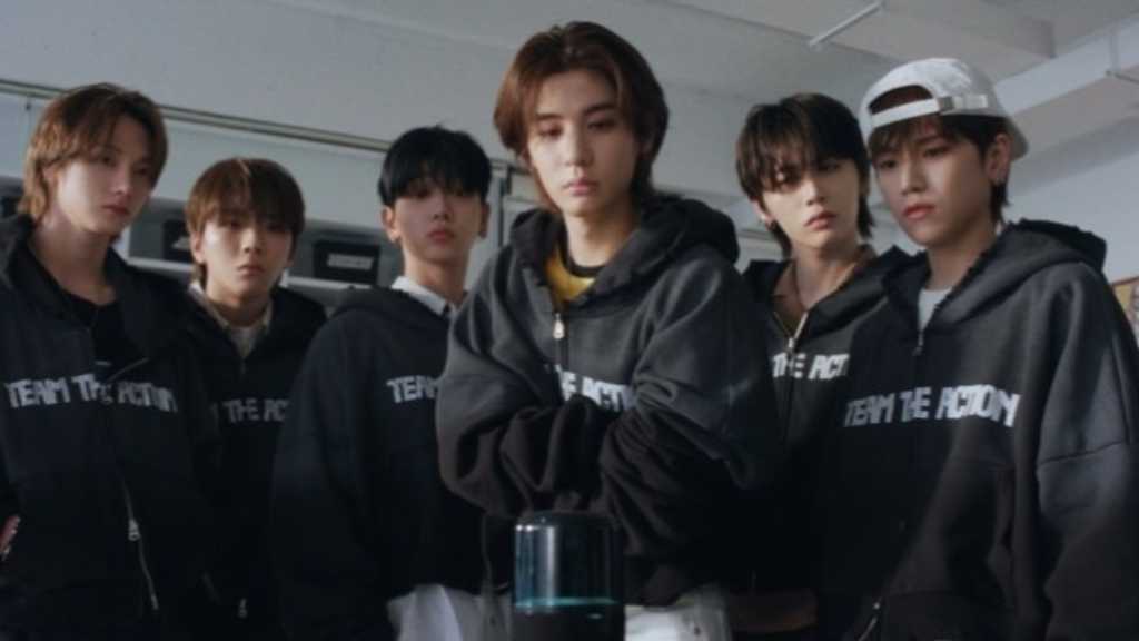 BOYNEXTDOOR announces new album 'The Action' releasing on Oct 20, showcasing a film crew concept in their promotional video.