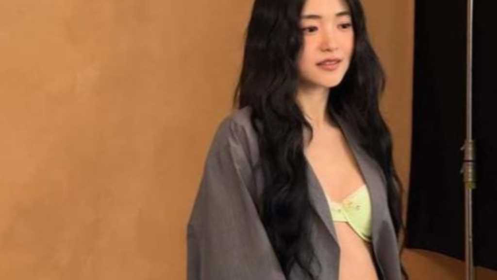 Actress Kim Tae-ri captivates with daring fashion at PRADA's 2026 collection show in Milan, sharing photos on Instagram.