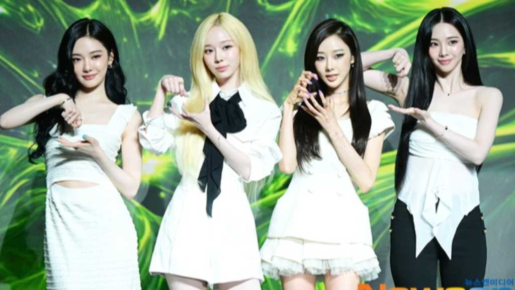 aespa held a press conference for their 2nd album 'LEMONADE' featuring a trendy electronic dance title track and exciting collaborations.