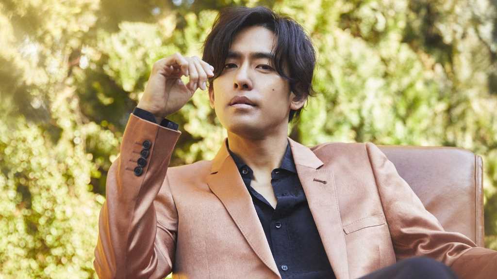 K celebrates 20 years as a singer-songwriter with a nationwide tour, culminating in a final concert at Zepp Namba on March 1, 2026.