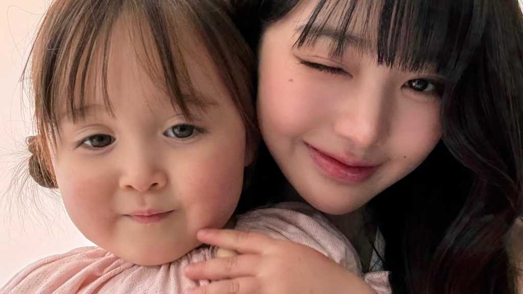 Wonyoung from IVE shares photos on Instagram, showcasing her charm with baby models during an ad shoot. IVE's albums have hit million-seller status.