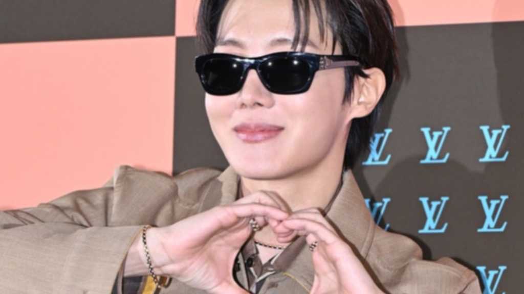 J-HOPE from BTS attends a Louis Vuitton event in Seoul, joined by other stars like Stray Kids' Felix and BLACKPINK's Lisa.