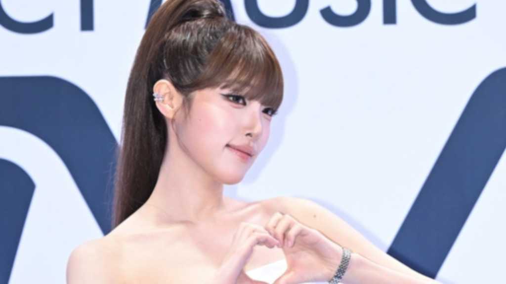Former IZ*ONE member Choi Ye-na appeared on the red carpet at the 2026 THE FACT MUSIC AWARDS in Busan.