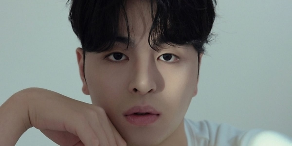 iKON's June to release 1st solo album on July 3rd after 9 years since debut, showcasing unique musical color and charm.