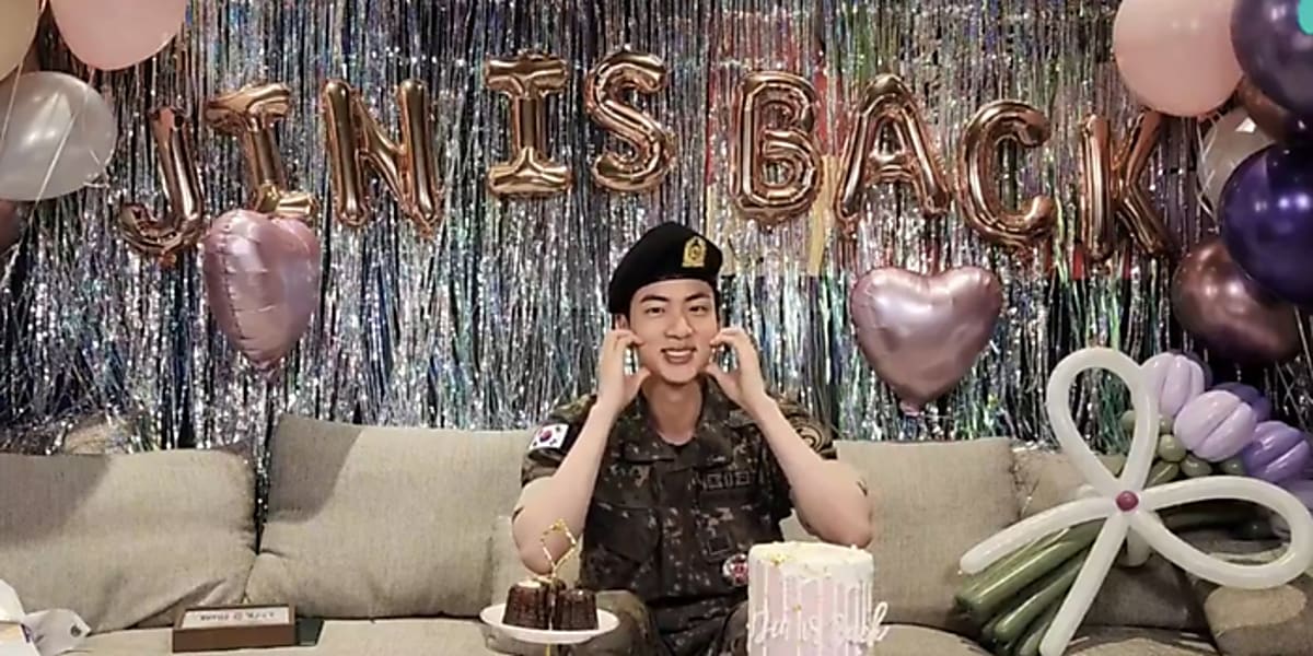 Jin fulfills promise with fans after discharge, sharing emotional moments and future plans. 