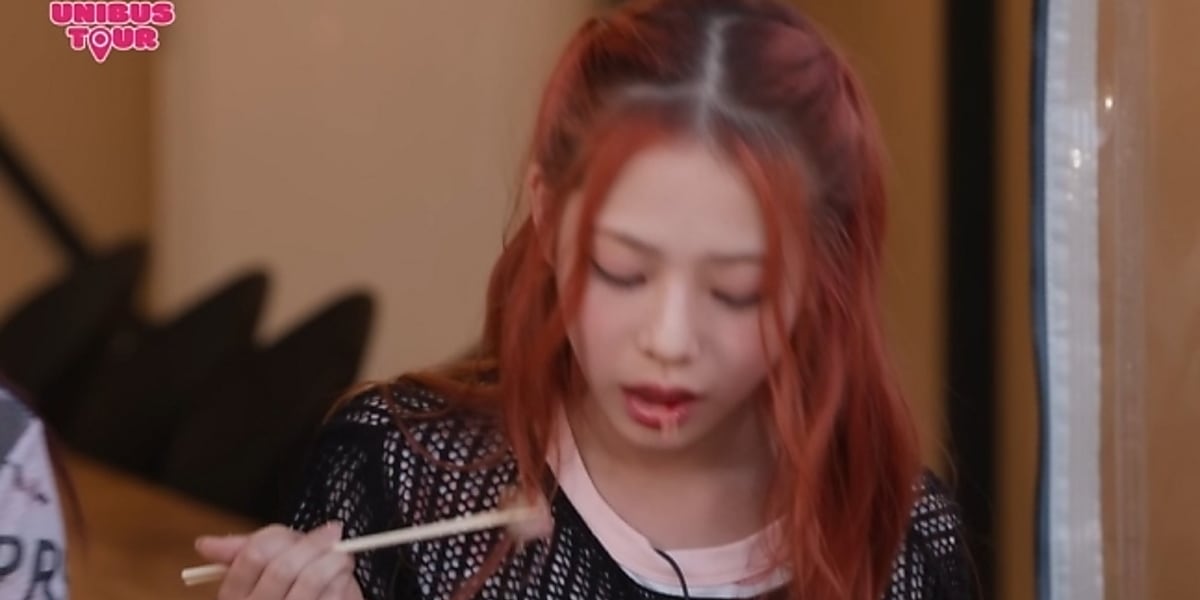 During a YouTube video, UNIS's Sowon lost a baby tooth while enjoying a BBQ with her group, surprising fans with the rare moment.