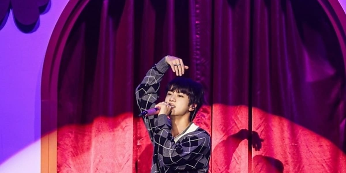 Jin of BTS transforms into a 'messenger of happiness' at his solo album showcase, sharing joy and stories with fans in Seoul.