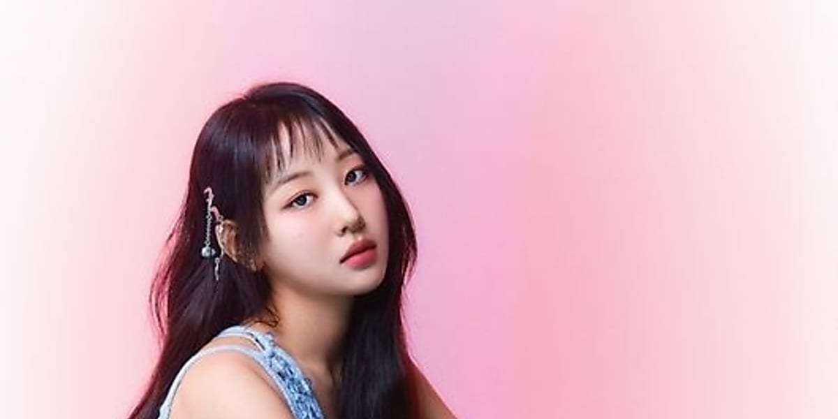 LOONA's Eve stuns in colorful gravure, expressing love for fans and dedication to her solo career while staying connected to her group.