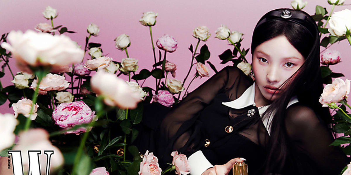 Soyeon from (G)I-DLE displays her charm in W KOREA Vol.9, featuring a shoot with Atelier Versace and her new single 'Klaxon.'