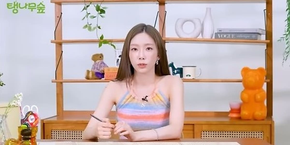 Taeyeon discusses her collaboration with Sam Smith, expressing gratitude and excitement about participating in his anniversary album.