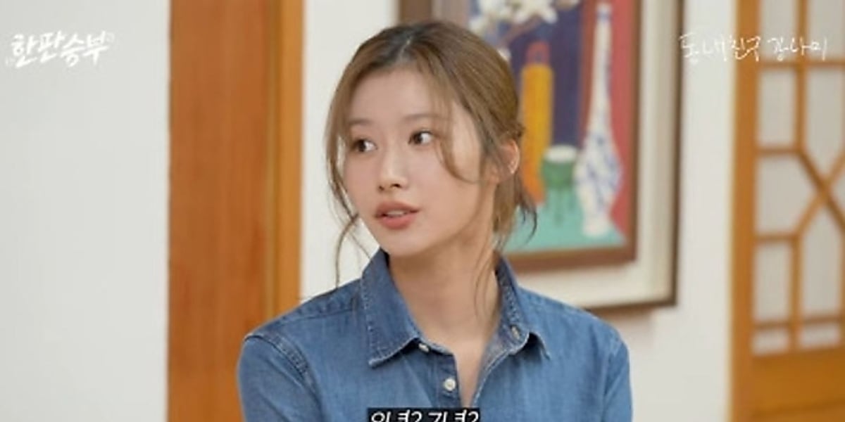 Sana from TWICE triumphs in a Korean language contest against KangNam, showcasing her improved skills and humor during the challenge.
